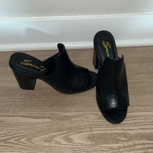 Never worn black heels, black leather and high quality